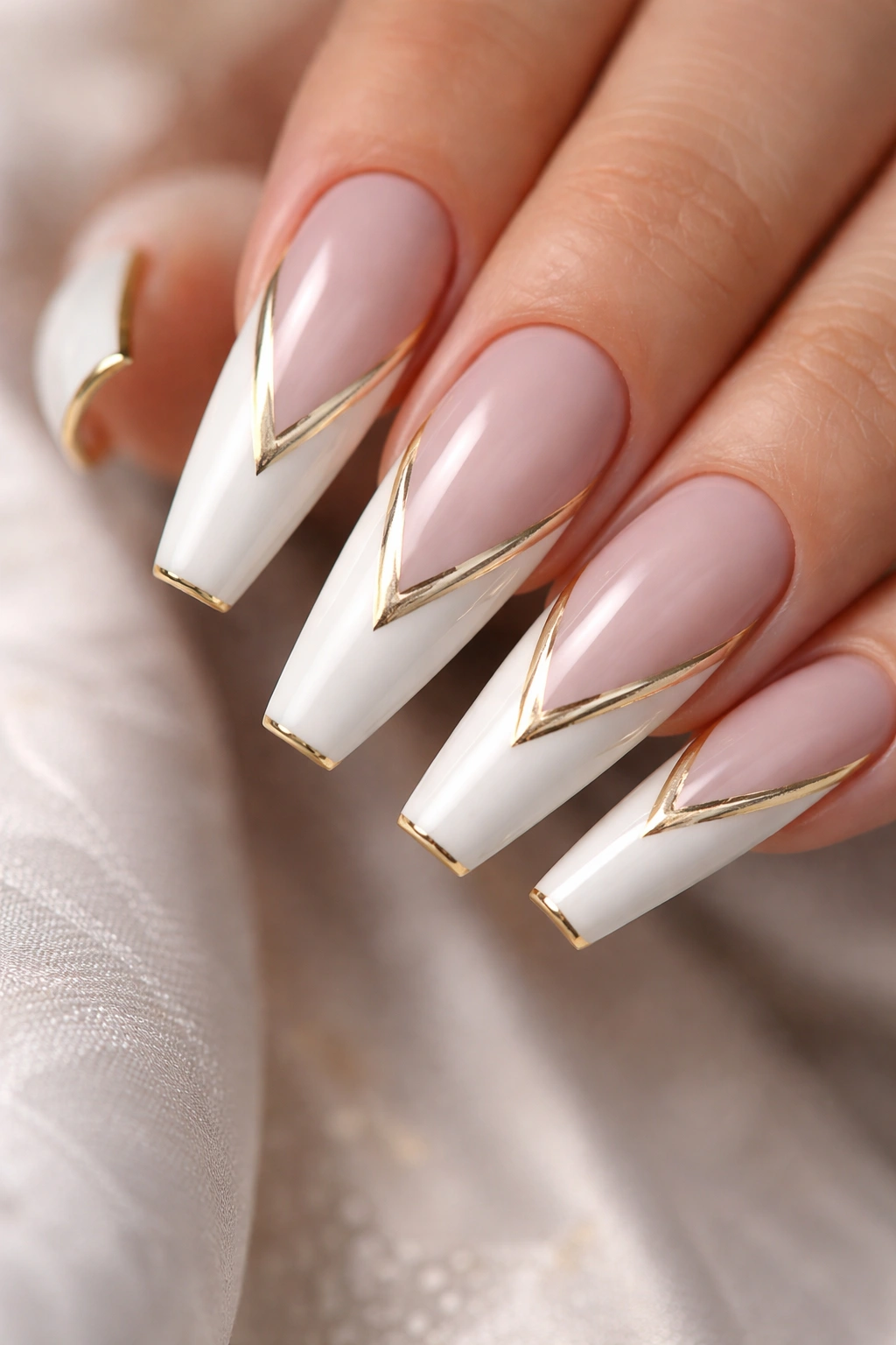 Coffin nails with white V-tip and gold frame