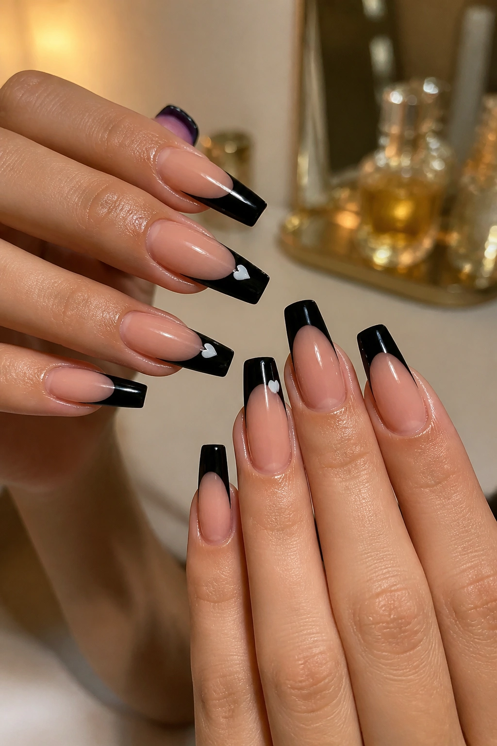 Black French coffin nails with white hearts