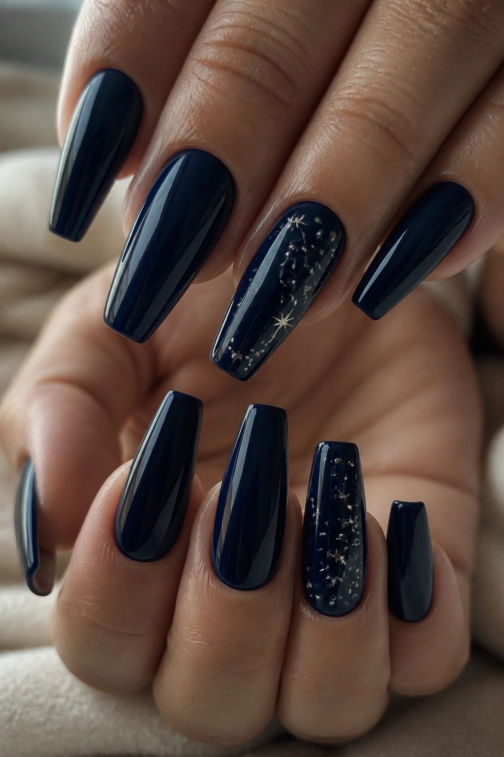 Dark blue coffin nails with constellation accents on accent nails