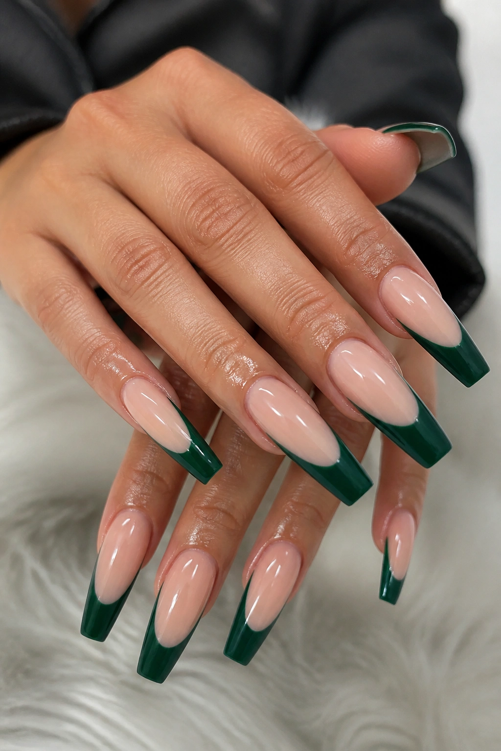 Emerald coffin nails with deep-curve tips and glossy finish.