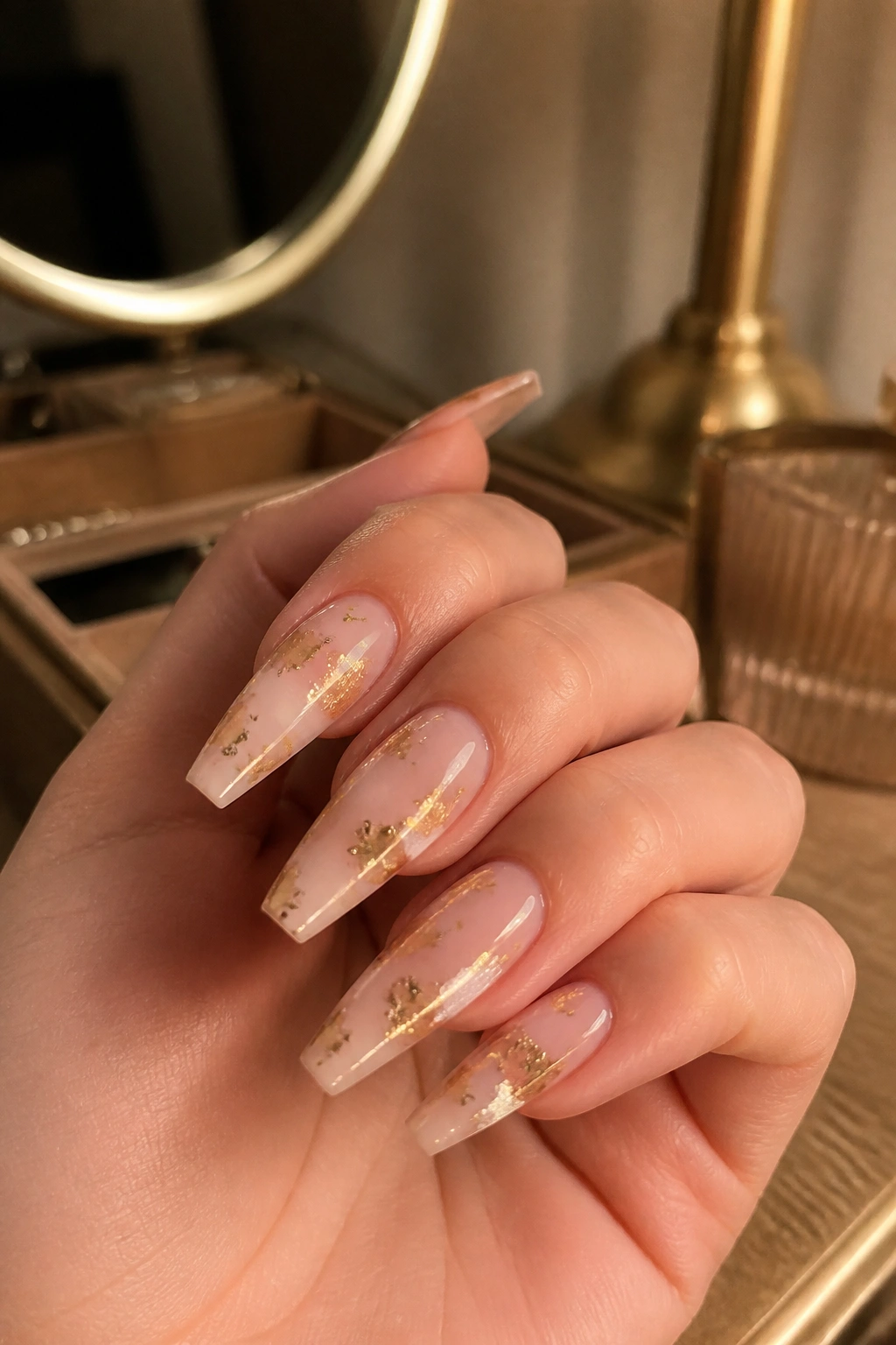 Nude coffin nails with gold foil accents