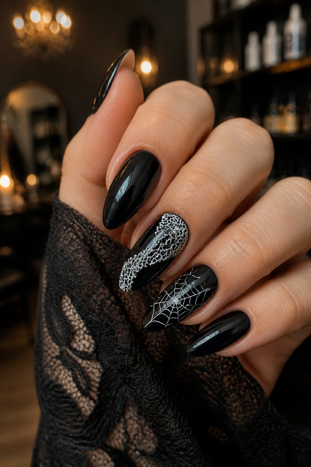 Black almond nail with white lace/web detailing
