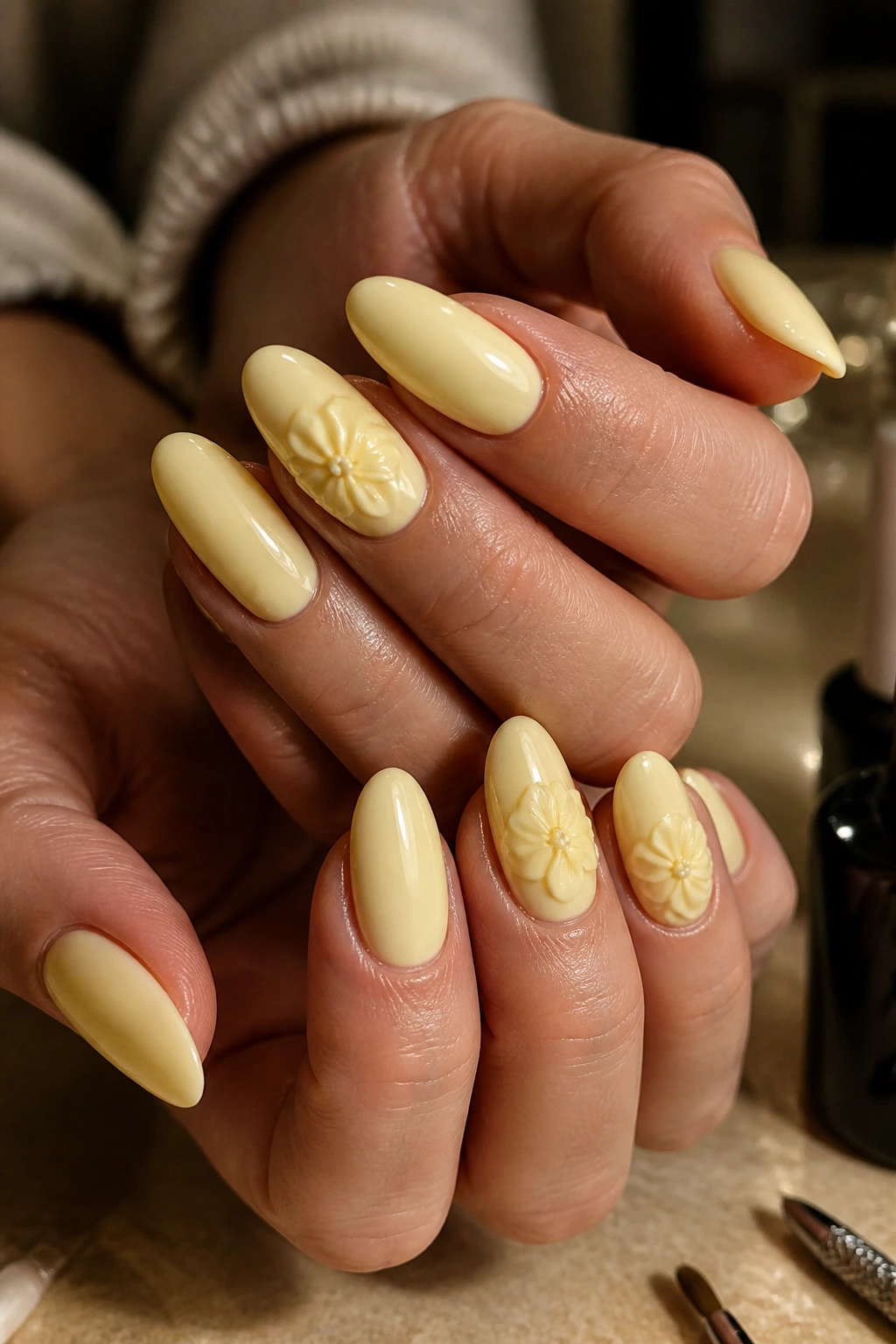 Almond nails with lemon cream base and 3D raised petals