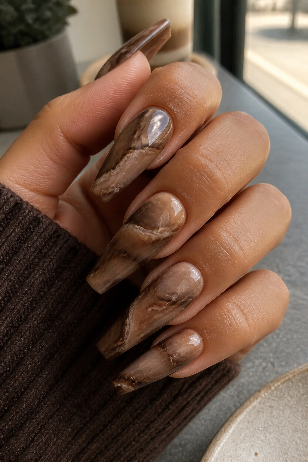 Close-up of Smoky Mocha Marble Coffin Nails showing brown marble pattern on coffin nails