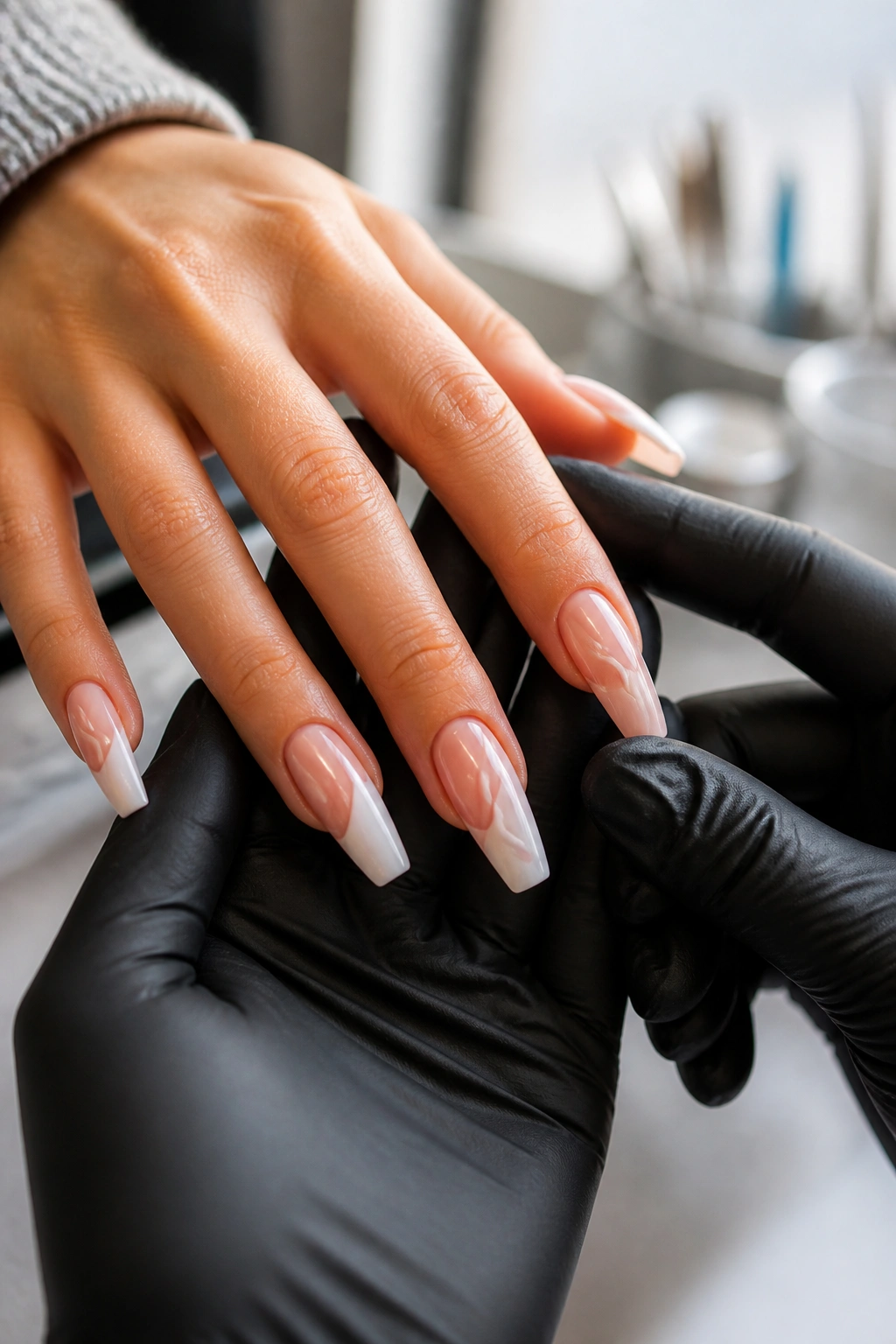 Close-up of nail consultation with hands and nails in a modern salon