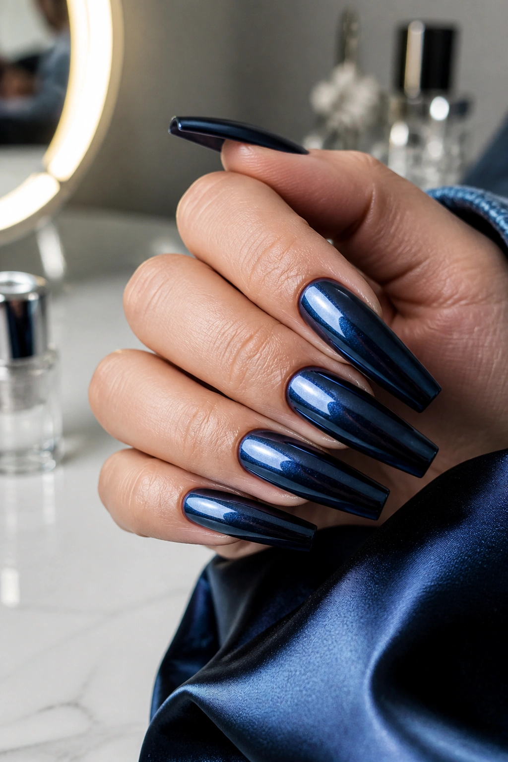 Navy coffin nails with chrome finish on real hand