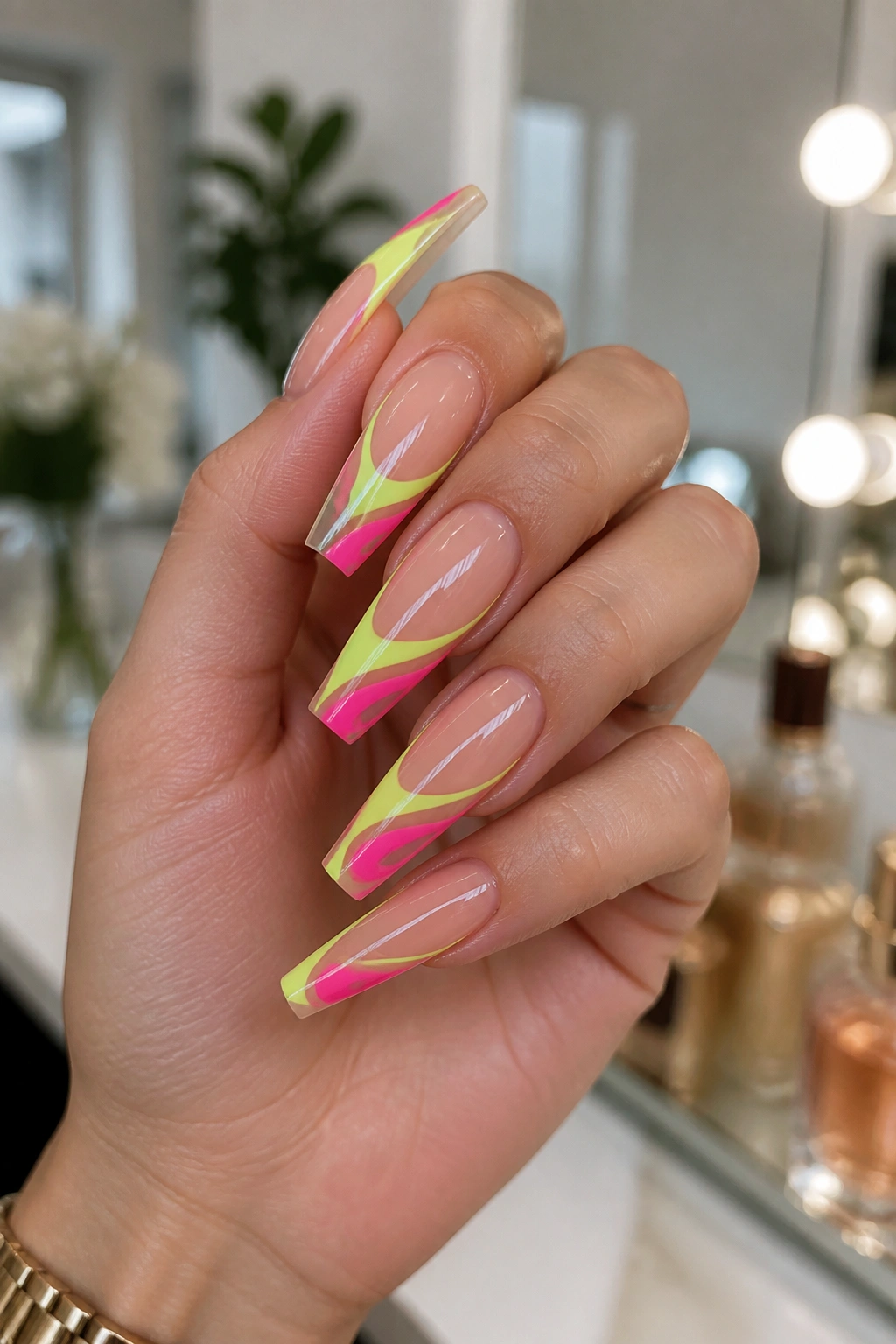 Long coffin nails with neon swirl tips on clear base