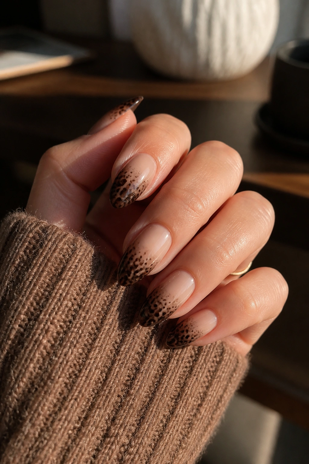 Almond nails with brown cheetah ombré fade