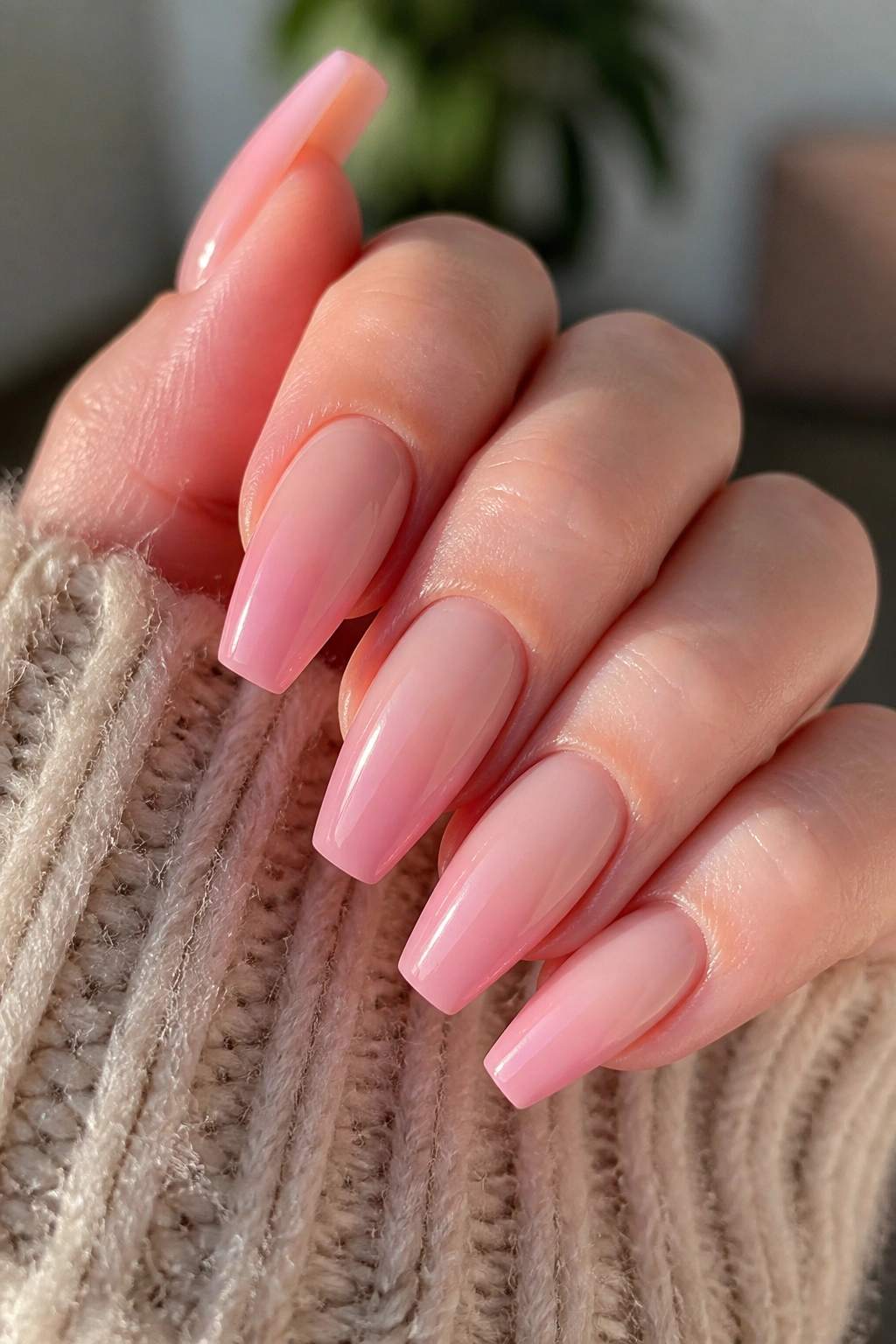 Ombré coffin nails blending nude to pink on real hand