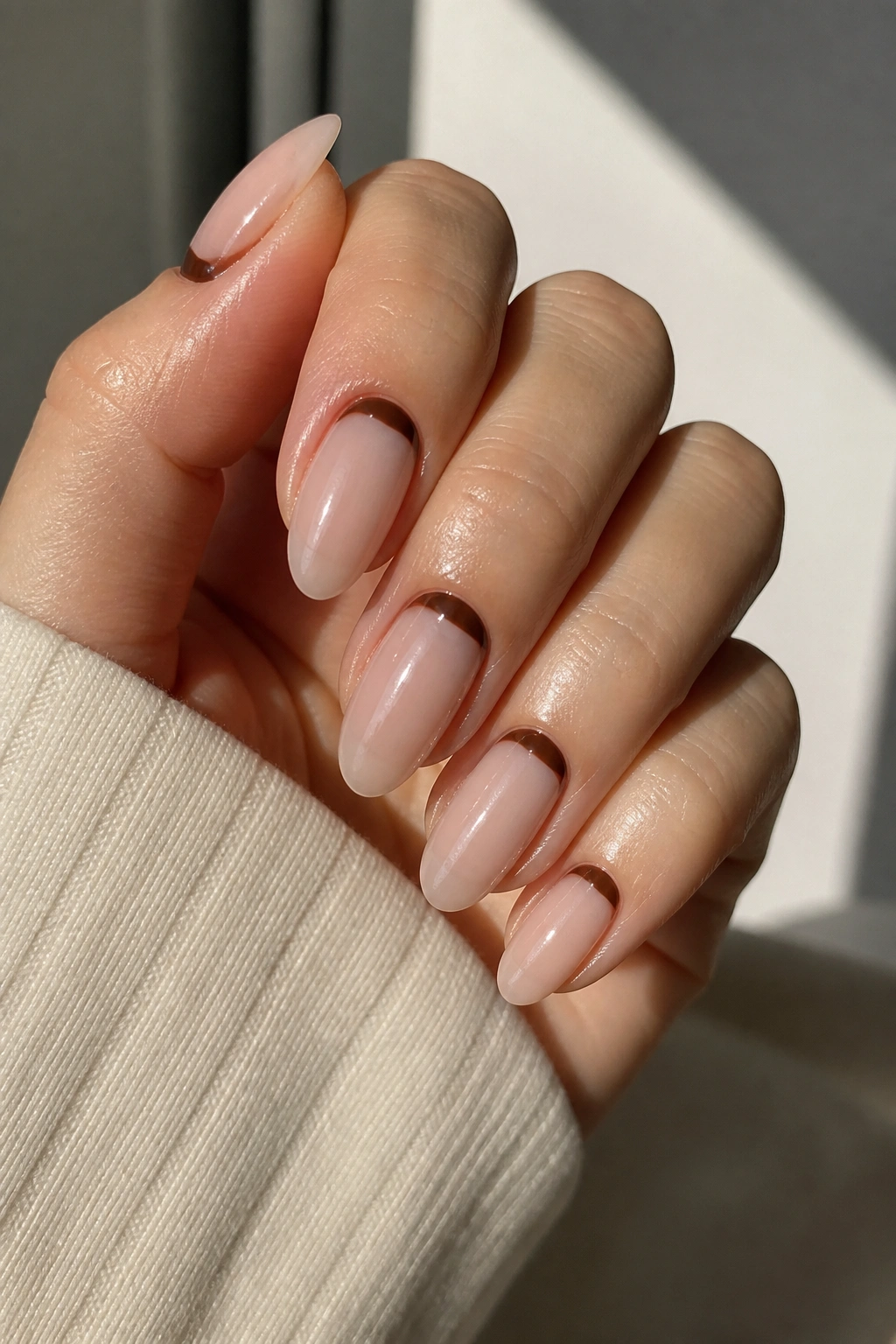 Almond nails with cuticle crescent brown reverse French