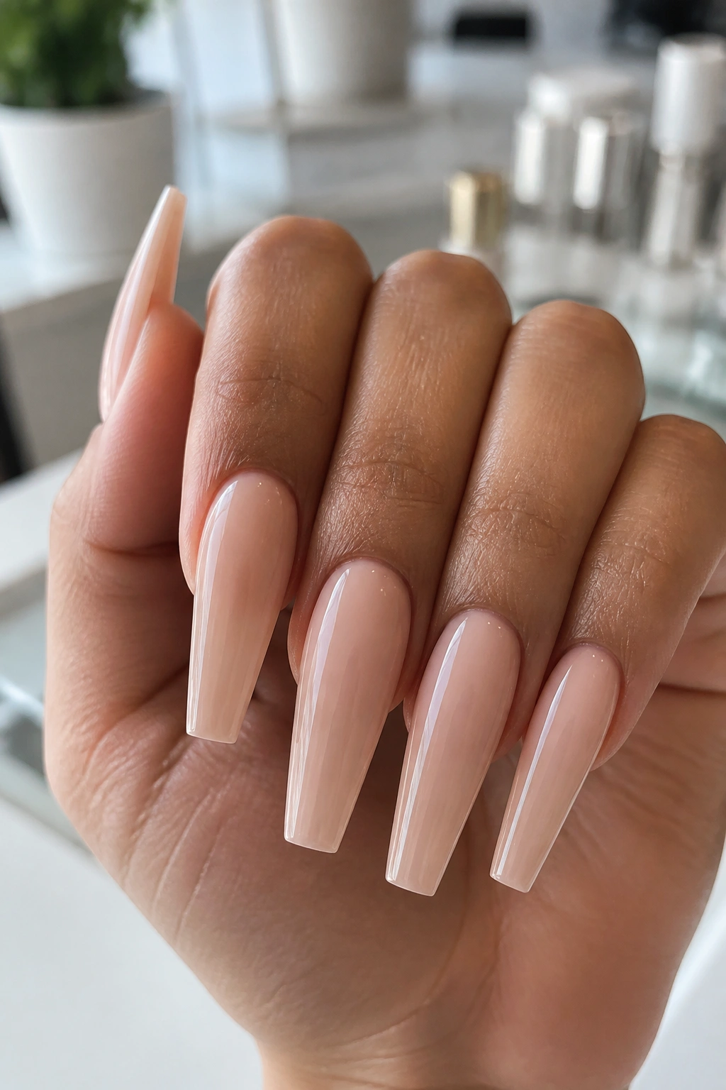 Close-up of sharp coffin nails on real hand