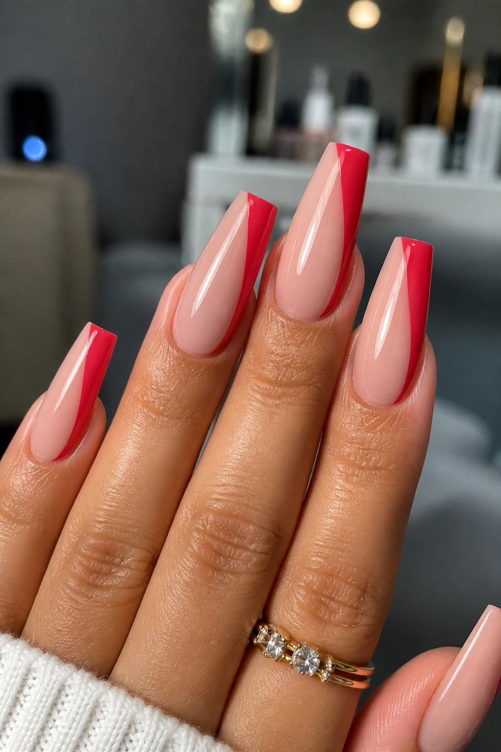 Close-up of hand with scarlet side-swipe coffin nails