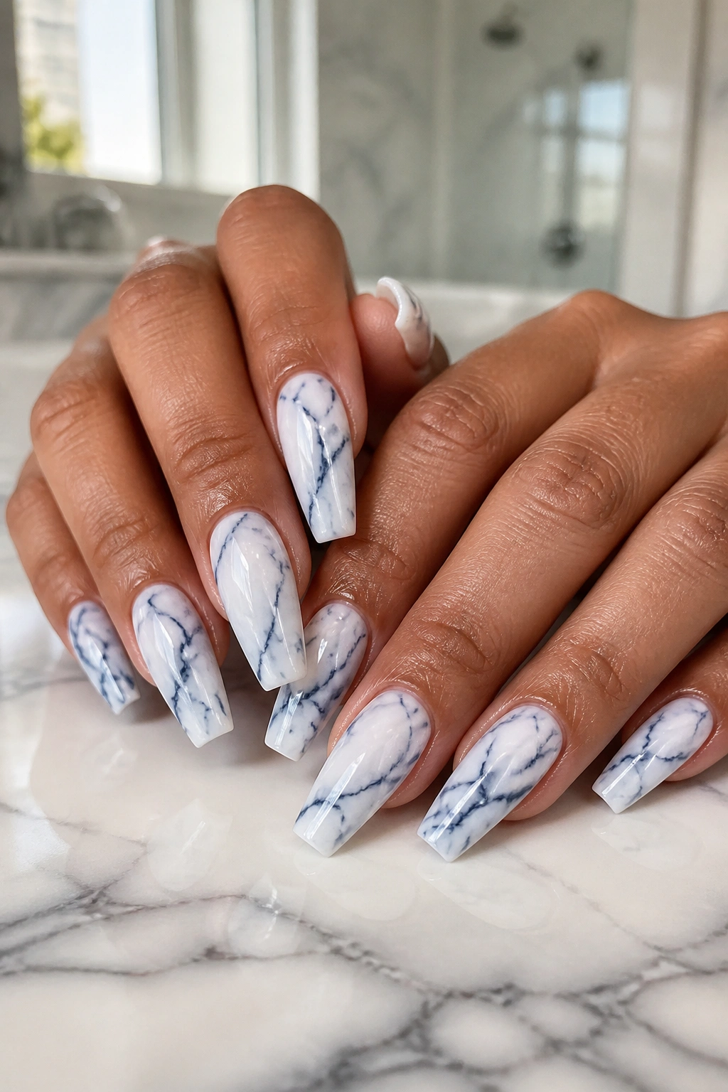 Coffin nails with white marble and blue veins design
